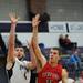 Pioneer High School's Aedan York takes a shot around Bedford High School's Adam Swisher during the first quarter at Pioneer on Tuesday, Feb. 19, 2013. Melanie Maxwell I AnnArbor.com